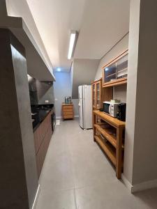 Casa com piscina aquecida, experiência única no litoral norte - Condomínio Morada da Praia!