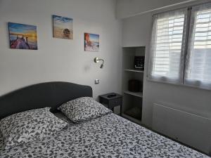 Appartements LES PIEDS DANS L'EAU - Acces direct a la plage : photos des chambres