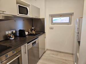Appartements LES PIEDS DANS L'EAU - Acces direct a la plage : photos des chambres