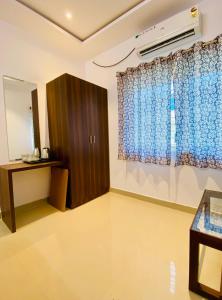 Tulips Inn Mysuru