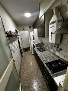 Departamento entero 2 habitaciones amoblado con terraza y living