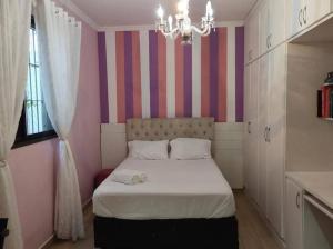 Casa confortável 3 suítes em Santos