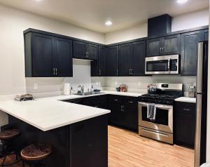 TWO townhomes for your giant group!