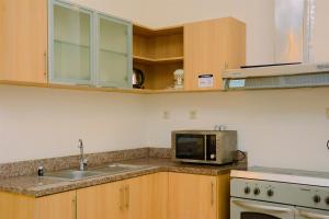 Modern 2BR at The Belleza Apartment By Travelio