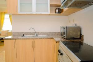 Modern 2BR at The Belleza Apartment By Travelio