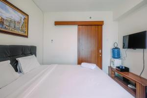Spacious 1BR at Grand Kamala Lagoon Apartment By Travelio