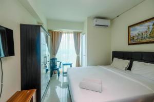 Spacious 1BR at Grand Kamala Lagoon Apartment By Travelio
