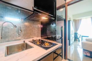 Spacious 1BR at Grand Kamala Lagoon Apartment By Travelio