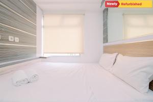 Cozy Stay 2BR Green Bay Pluit Apartment By Travelio
