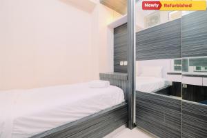 Cozy Stay 2BR Green Bay Pluit Apartment By Travelio