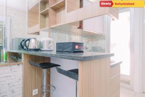 Cozy Stay 2BR Green Bay Pluit Apartment By Travelio