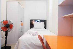 Cozy and Minimalist 2BR Apartment @ Signature Park Grande By Travelio