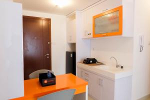 Cozy and Minimalist 2BR Apartment @ Signature Park Grande By Travelio