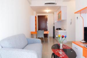 Cozy and Minimalist 2BR Apartment @ Signature Park Grande By Travelio