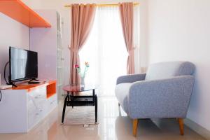 Cozy and Minimalist 2BR Apartment @ Signature Park Grande By Travelio