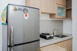 Fully Furnished with Cozy Design Studio Poris 88 Apartment By Travelio