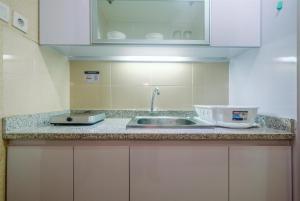 Fully Furnished with Luxury Design Studio The Oasis Apartment By Travelio