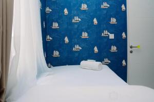 Gorgeous 2BR Springlake Summarecon Apartment By Travelio