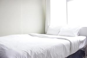 Homey 3BR Apartment at The Jarrdin Cihampelas By Travelio