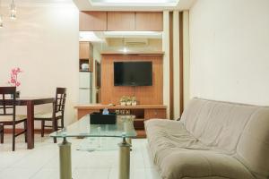 Homey and Compact 2BR Mediterania Marina Ancol Apartment By Travelio
