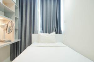 Fully Furnished with Comfortable Design 2BR Harco Mangga Besar Apartment By Travelio