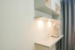 Fully Furnished with Comfortable Design 2BR Harco Mangga Besar Apartment By Travelio