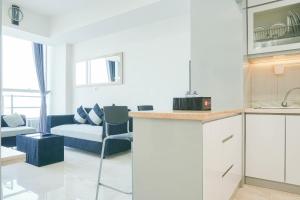 Fully Furnished with Comfortable Design 2BR Harco Mangga Besar Apartment By Travelio