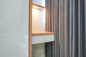 Fully Furnished with Comfortable Design 2BR Harco Mangga Besar Apartment By Travelio