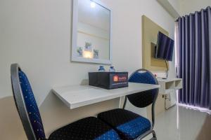 Homey Studio at Bogorienze Apartment near The Jungle Waterpark By Travelio