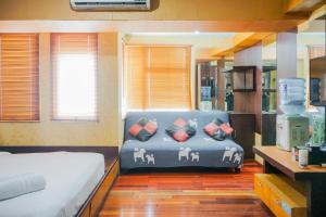 Simple and Minimalist Studio Apartment at Great Western Resort By Travelio