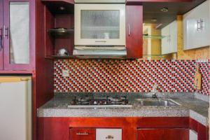 Simple and Minimalist Studio Apartment at Great Western Resort By Travelio