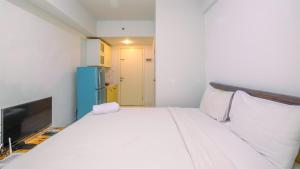 Homey Studio Apartment at Dramaga Tower near IPB By Travelio