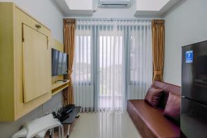 Elegant and Comfort 2BR at Royal Heights Apartment By Travelio