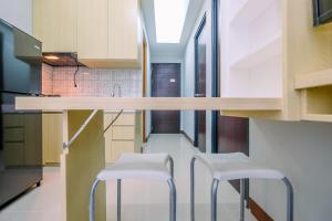 Elegant and Comfort 2BR at Royal Heights Apartment By Travelio