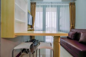 Elegant and Comfort 2BR at Royal Heights Apartment By Travelio