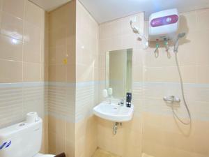 Minimalist and Spacious 1BR Apartment at Parahyangan Residence By Travelio