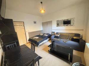 Appartements Le Lorrain Wifi Un Sejour a Part : photos des chambres