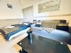Appartements Le Lorrain Wifi Un Sejour a Part : photos des chambres