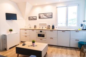 Appartements Residence grand jardin attenant tennis, mini golf, sauna, petanque : photos des chambres