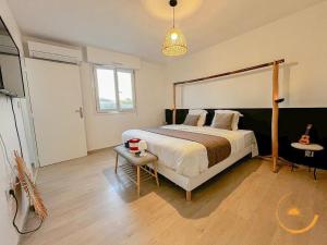 Appartements T3 Luxueux Bali Cote Mer & Tram - Lattes : photos des chambres
