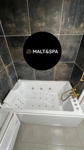 Appartements Malt&SPA jacuzzi privatif : photos des chambres