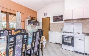 Two-Bedroom Holiday Home In Dolenja Vas