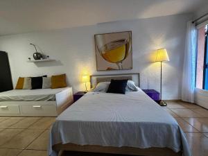 Appartements Lumineux Studio tout equipe : Appartement 1 Chambre de Luxe - Vue sur Jardin