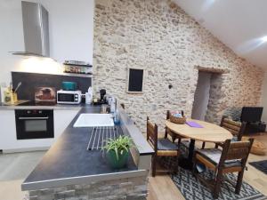 Appartements GITE 3* SAINT GUILHEM LE DESERT CHEZ MARIUS : photos des chambres