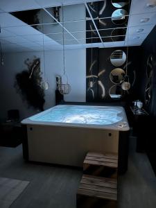 Appartements L-escapade sensuelle - la love room d-Epernay : photos des chambres