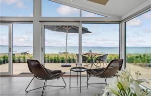Nice Home In Rønde With House Sea View