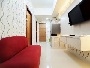 Good Deal and Comfy 1BR Vida View Apartment By Travelio