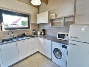 Holiday home with terrace, sauna