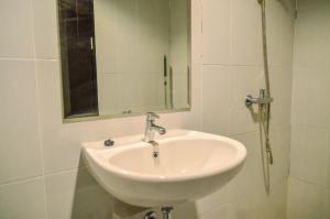 Compact and Modern Studio Room at Casa De Parco Apartment By Travelio