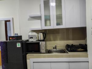 Homey and Comfy 2BR at Vida View Apartment By Travelio